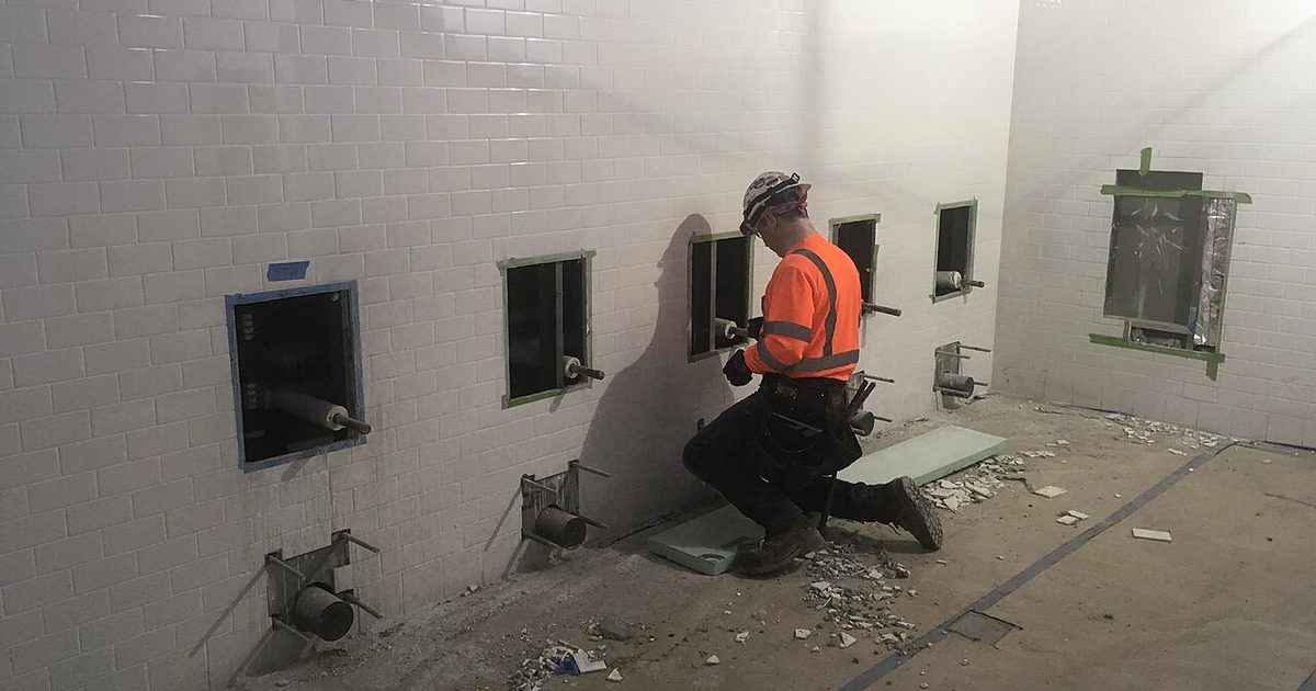 Bathroom plumbing rough-in before toilet installation