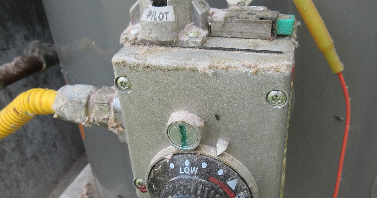 The control panel and gas connection on a gas hot water unit